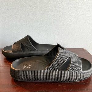 Woman’s Size 8, Black Slip-On sandals. Never worn